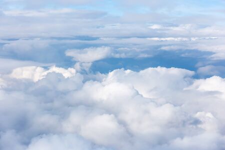 clouds and blue sky seen from planeの写真素材