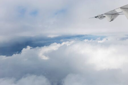 clouds and blue sky seen from planeの写真素材