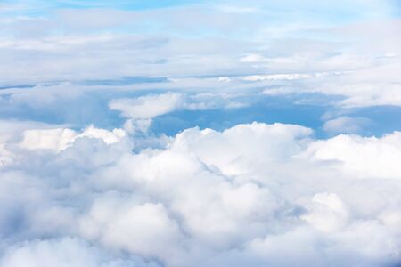 clouds and blue sky seen from planeの写真素材