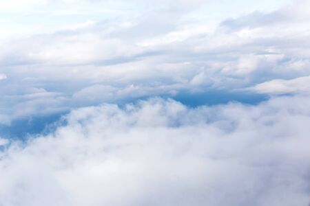 clouds and blue sky seen from planeの写真素材