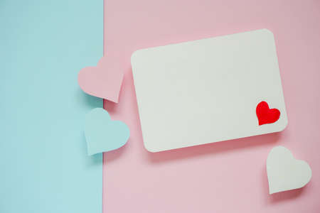 Valentine card ideas with blank paper cut on pink paper and blue paper.の写真素材