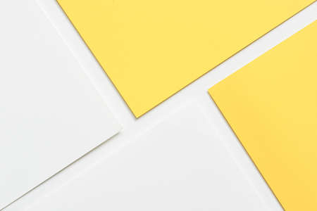 On a white background, an abstract background notion of white and yellow blank paper alignmentの写真素材