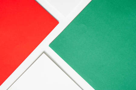 On a white background, an abstract background notion of white and green and red blank paper alignmentの写真素材