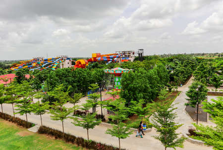 Hyderabad, Telangana India - 17 08 2019: Top View of Water / Aqua Park surrounded by water rides,...