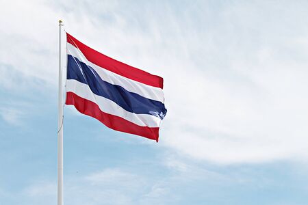 Thailand flag with cloudy blue sky background, Thailand flag waving, Thailand flag blowing the windの写真素材