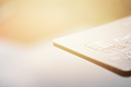 Business, finance, credit card, shopping, saving money, banking, loan, investment, taxes or accounting concept : Credit card on office desk tableの写真素材