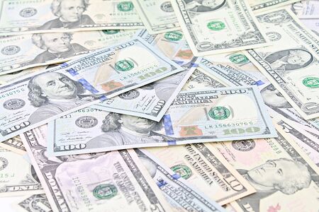Business, finance, investment or money exchange concept : American Dollars cash money on white...
