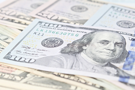 Business, finance, investment or money exchange concept : American Dollars cash money on white...