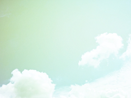 Nature or background concept : White clouds and blue sky, retro or vintage tone with copy spaceの写真素材