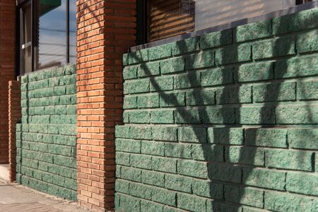 building with green brick textureの写真素材