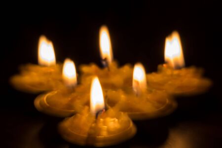 candle-light with reflection of black backgroundの写真素材