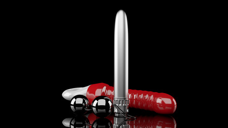 computer rendered 3D sex toys on black backgroundの写真素材