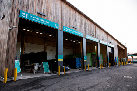 KIRKKONUMMI, Finland - OCT 04, 2019: Sorting station HSY - center for sorting, safe disposal and recycling of garbage. Row of containers for different types of wasteのeditorial素材