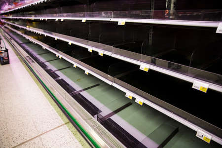 Espoo, Finland - 13 of march 2020: Empty shelves of supermarkets in Espoo, Finland. People stockpiling during Coronavirus pandemicのeditorial素材
