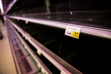 Espoo, Finland - 13 of march 2020: Empty shelves of supermarkets in Espoo, Finland. People stockpiling during Coronavirus pandemicのeditorial素材