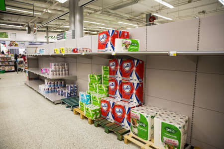 Espoo, Finland - 13 of march 2020: Empty shelves of supermarkets in Espoo, Finland. People stockpiling during Coronavirus pandemicのeditorial素材
