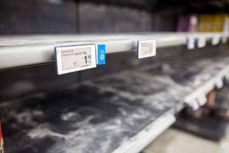 Espoo, Finland - 13 of march 2020: Empty shelves of supermarkets in Espoo, Finland. People stockpiling during Coronavirus pandemicのeditorial素材