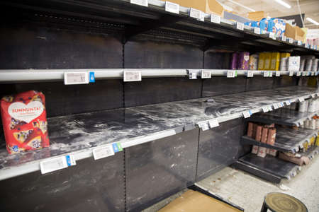 Espoo, Finland - 13 of march 2020: Empty shelves of supermarkets in Espoo, Finland. People...