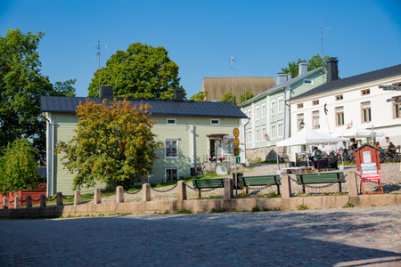 Porvoo, Finland - September 2: Narrow cobblestoned streets of Old town of Porvoo. Picturesque colorful wooden houses. Historic center, touristic place, landmark of Finland. Warm sunny summer day in nordic country.のeditorial素材