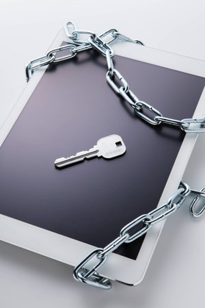 Tablet and keyの写真素材