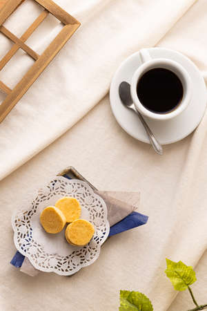 a cookie piled up on a plate on a tableの写真素材