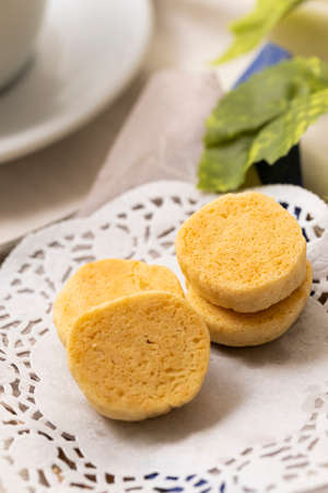 a cookie piled up on a plate on a tableの写真素材