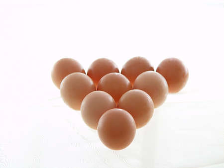 Ten eggs in  the formation of a triangle.