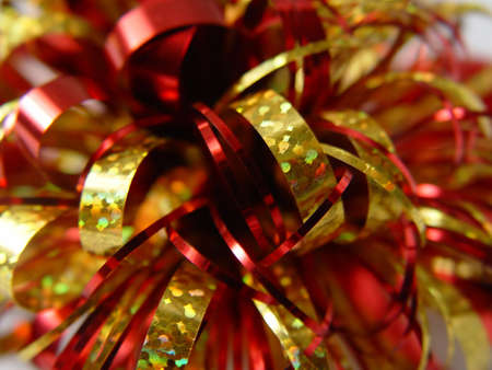 Red and gold bow macro shot blur.の写真素材