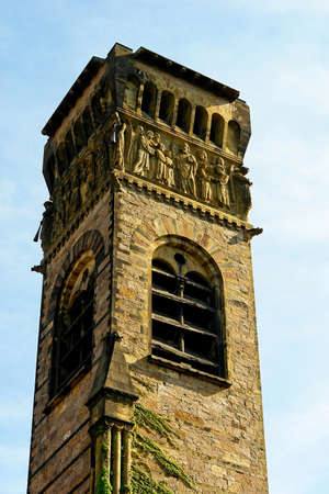 looking up at one of the oldest church towers in boston with carvings of the apostles and angelsの写真素材