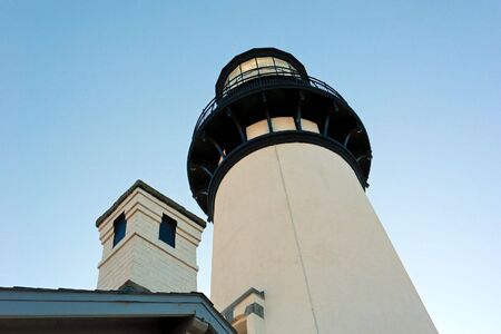 looking up at an old lighthouse in oregonの写真素材