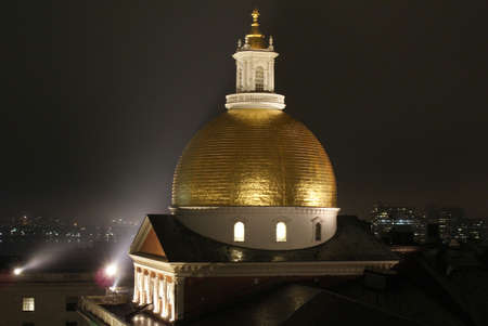 the massachusetts state house lit by  spot lightsの写真素材