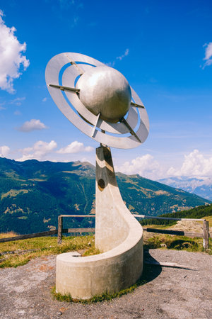 Saint-Luc, Valais, Switzerland - August 8 2018: Planet Saturn statue high up in the Pennine Alps on the Planets Trail on a sunny day in the summerのeditorial素材