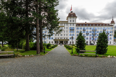 St. Moritz-Bad, Grisons, Switzerland - August 8 2016 : Driveway with gravel to the Grand Hotel Des Bains Kempinski on a cloudy summer dayのeditorial素材
