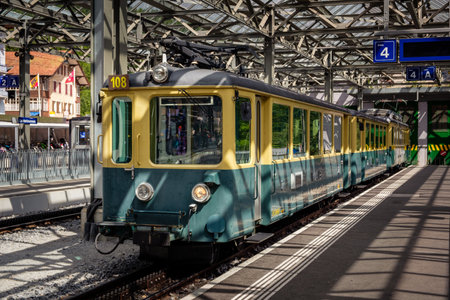Lauterbrunnen, Bernese Oberland, Switzerland - July 29 2019: Old train of Wengernalpbahn (WAB) at the platform in the railway stationのeditorial素材