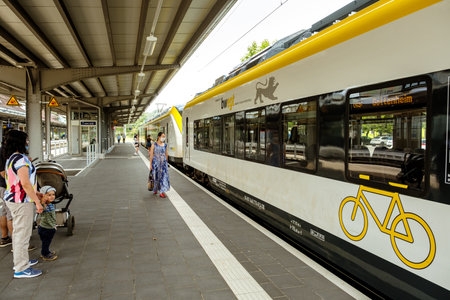 Titisee-Neustadt, Baden-WÃ¼rttemberg, Germany - July 28 2020: Passenger train from bwegt (DB regio) in the Titisee railway station, passengers with face mask protection on the platformのeditorial素材