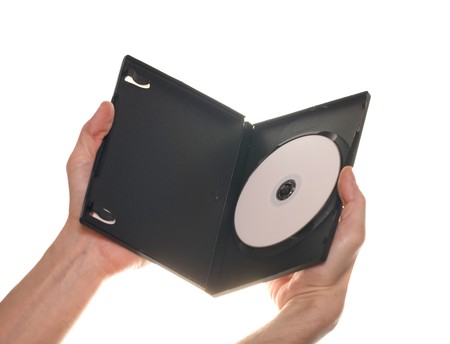 Men's hand holding DVD CD disc on white background isolatedの写真素材