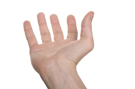 well shaped businessman hand reaching for something isolated on whiteの写真素材