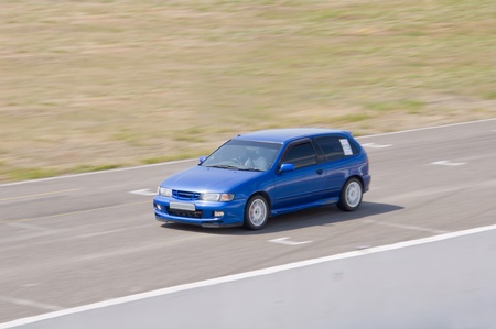 Fast car in a raceの写真素材