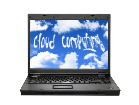 Laptop with clouds and cloud computing textの写真素材
