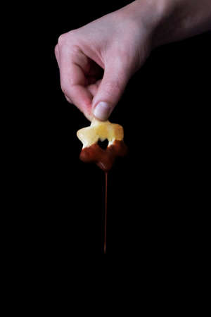 Natural and healthy dessert of homemade cookies with dark chocolateの写真素材