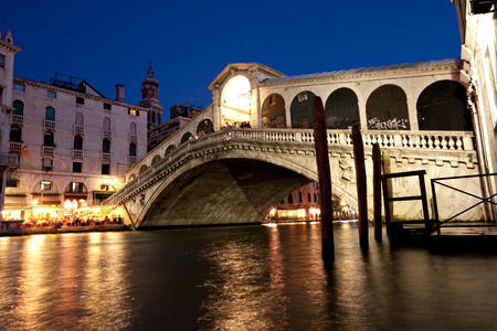The Rialto Bridge, a famous Venice landmark, at night.の写真素材