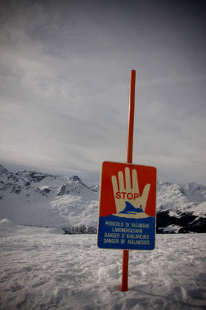 Avalanche warning sign in the mountainsの写真素材