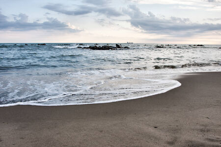 Seascape at night with the sky overcastの写真素材