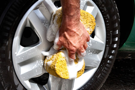 car wash with a sponge and soapの写真素材