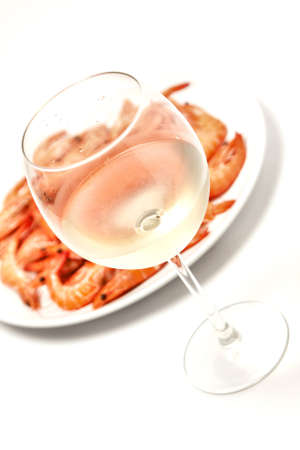 Prawn with a glass of white wineの写真素材