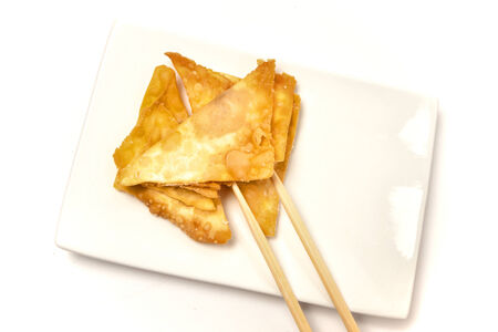 wanton fried on a flat whiteの写真素材