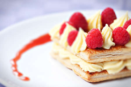 Raspberry Tart with Fresh Cream in Puff Pastryの写真素材