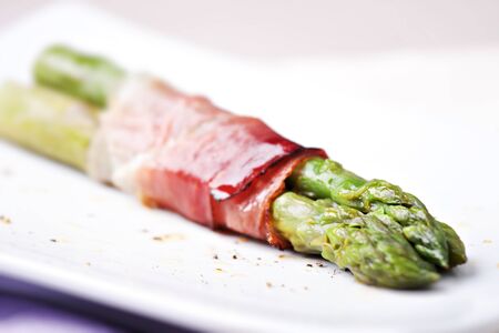 Ham rolls with asparagus and bechamelの写真素材