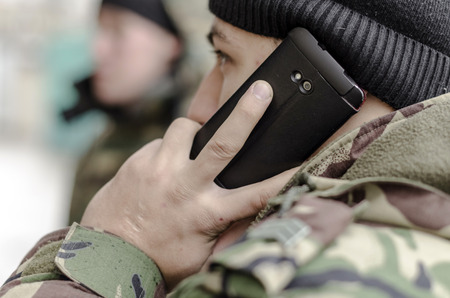 Military telephoned his superiors to report