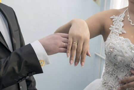 wedding rings newlyweds on their wedding dayの写真素材